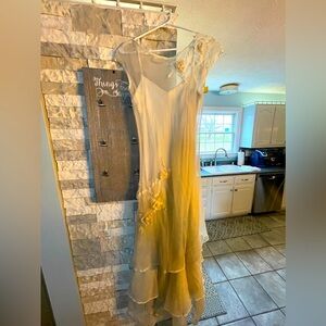 Gorgeous never worn linen and chiffon dress with beautiful flower detail.